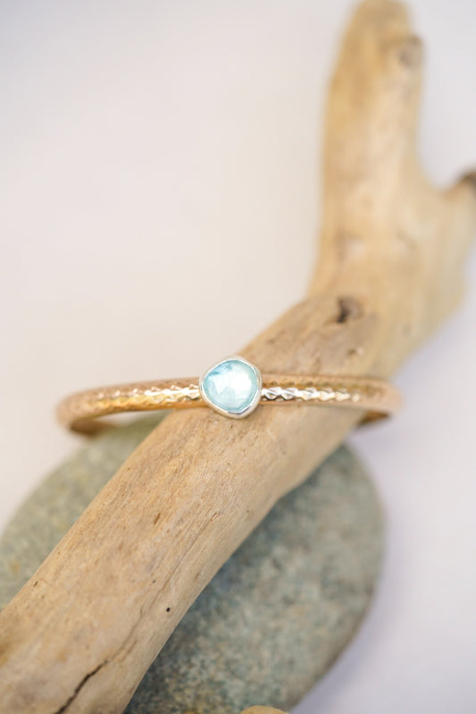 gold stamped cuff with aquamarine