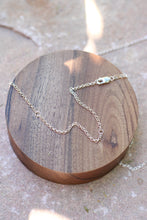 Load image into Gallery viewer, Silver chain necklace on a wooden surface