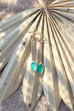 Load image into Gallery viewer, Green earrings on a palm leaf
