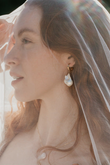 Woman wearing a veil with a soft, blurred background